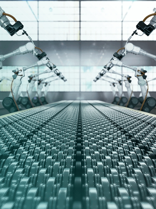 An assembly line of robotic arms in a factory